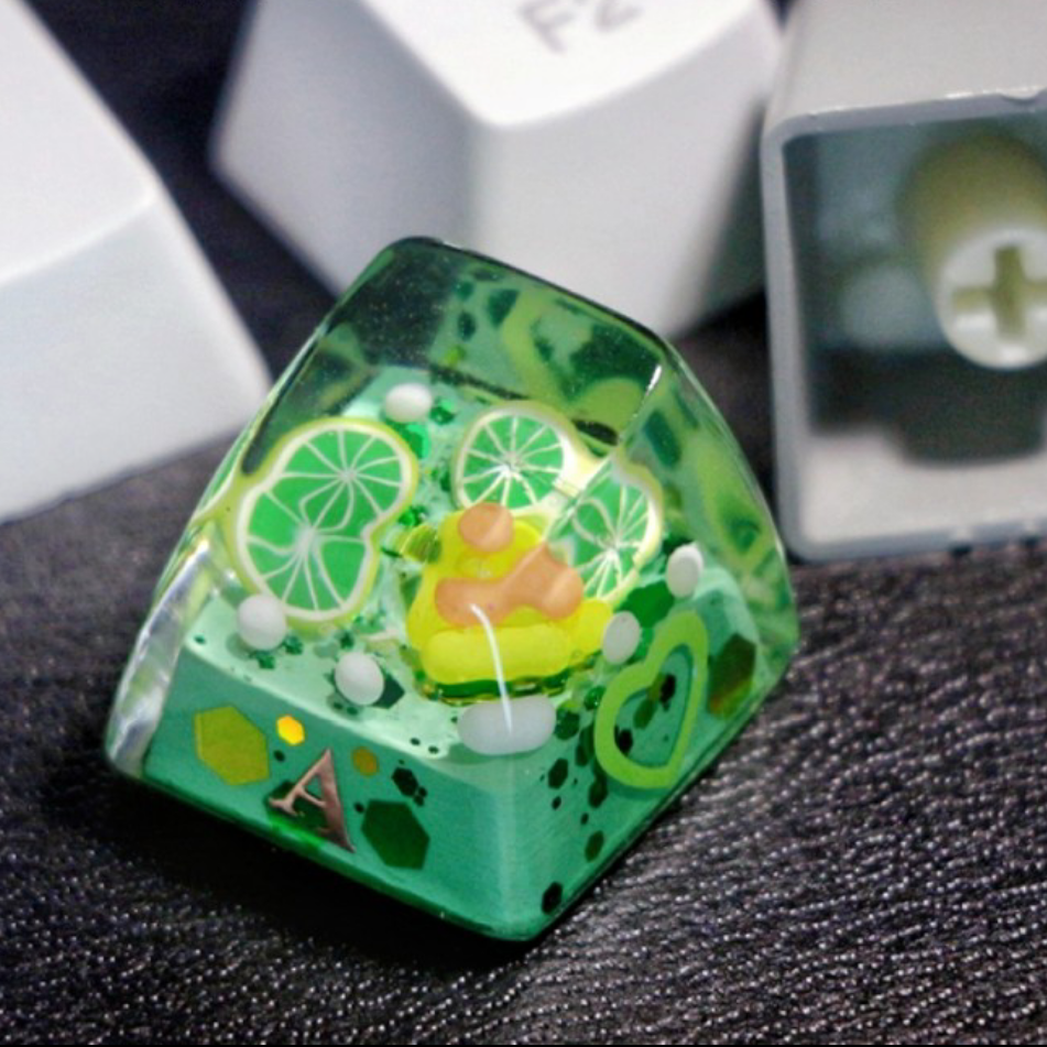 "Refresh your keyboard setup with our 'Lime Soda' Custom Artisan Keycaps. These handcrafted keycaps are inspired by the zesty goodness of lime soda, bringing a burst of citrusy charm to your typing experience. Crafted with precision, they feature a playful lime soda design that's both stylish and unique. Quench your thirst for creativity with these delightful artisan keycaps." 🍋🥤💻 #KeyboardAccessories #ArtisanKeycaps #LimeSodaVibes