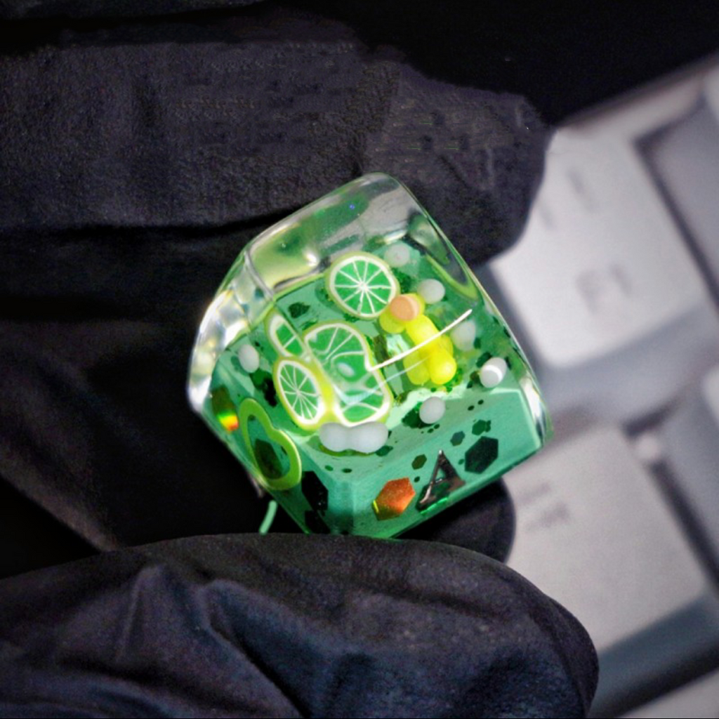 "Refresh your keyboard setup with our 'Lime Soda' Custom Artisan Keycaps. These handcrafted keycaps are inspired by the zesty goodness of lime soda, bringing a burst of citrusy charm to your typing experience. Crafted with precision, they feature a playful lime soda design that's both stylish and unique. Quench your thirst for creativity with these delightful artisan keycaps." 🍋🥤💻 #KeyboardAccessories #ArtisanKeycaps #LimeSodaVibes