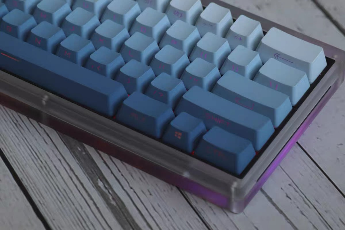 Elevate Your Keyboard with Gradient Misty Blue Side-Printed Keycaps  Your keyboard, your canvas! Introducing our Gradient Misty Blue Side-Printed Keycaps, a perfect blend of style and functionality.  Side-Printed Design: Experience effortless key identification with side-printed legends. Say goodbye to hunting for the right key.  Gorgeous Gradient: The mesmerizing gradient in misty blue adds a touch of elegance to your keyboard, ensuring it stands out in any setting.