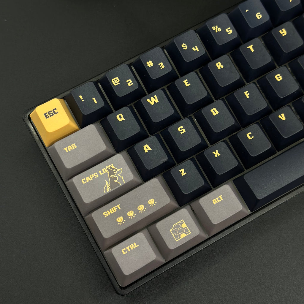 Mechanical keyboard with 68-key layout and Monster Hunter keycap set, ideal for gaming setups.