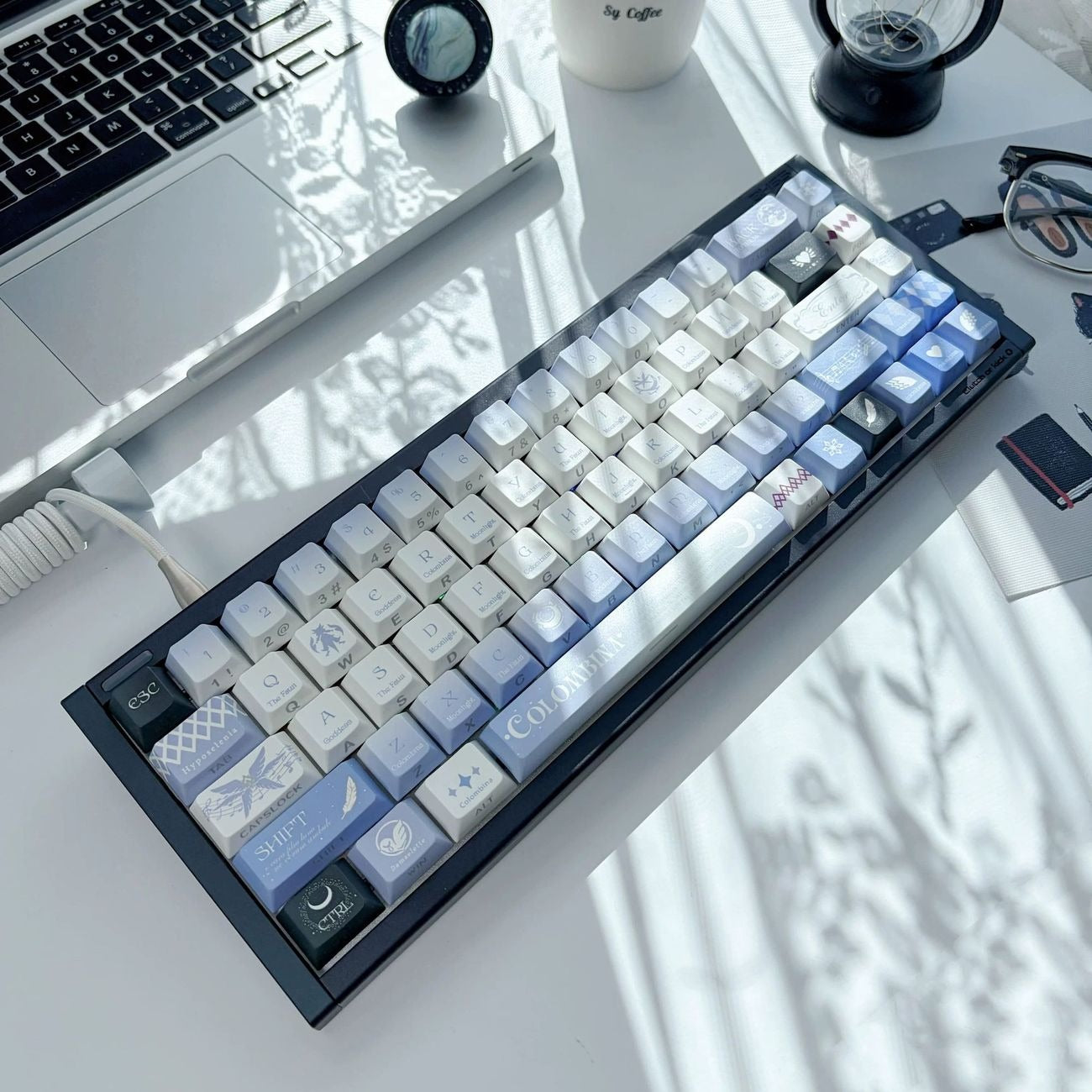 Fantasy anime inspired Moon Girl keycap set with soft blue and white colors, moonlight themed designs, and decorative patterns. The PBT mechanical keyboard keycaps create a calm, elegant, and personalized aesthetic for anime lovers and custom keyboard enthusiasts.