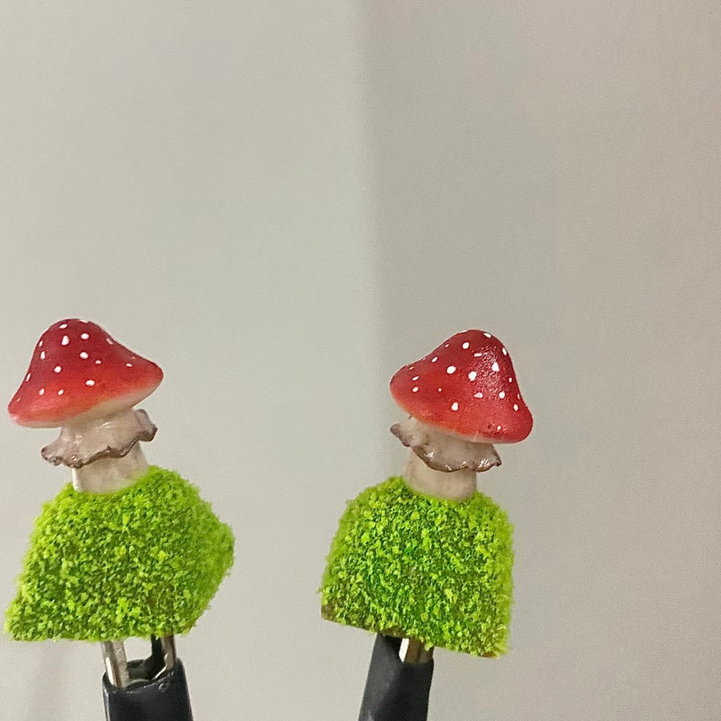 Handcrafted Mushroom Keycap Set  Step into a whimsical world with our Handmade Mushroom Keycap Set, where mushrooms thrive on a bed of lush moss, adding an enchanting touch to your keyboard.  Mystical Details:  Each keycap is a testament to craftsmanship, meticulously created to resemble the beauty of nature. These tiny mushrooms sprout from a bed of moss, making your keyboard a portal to a fairy tale realm.