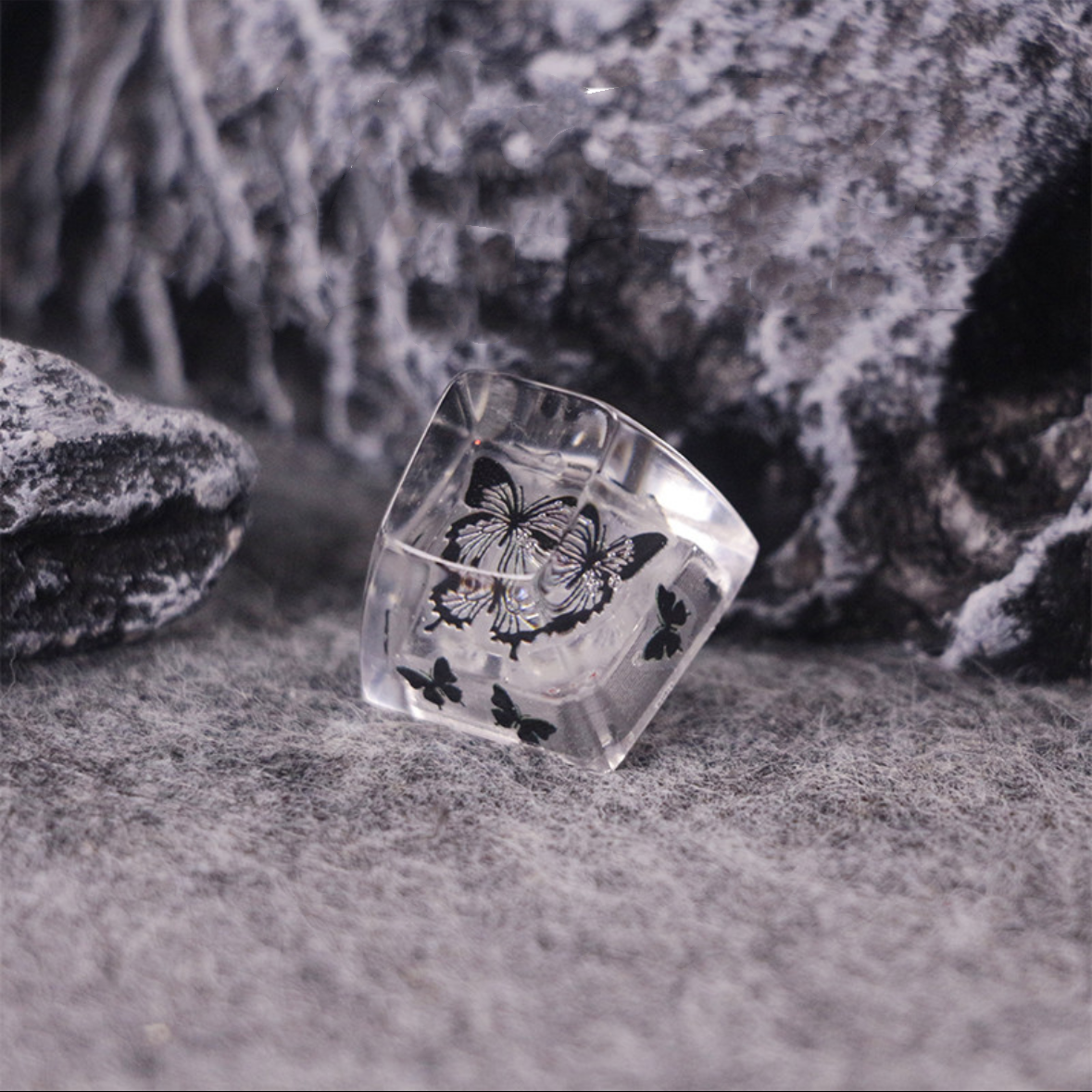 "Unveil the allure of our 'Mysterious Black and White Butterfly' Custom Artisan Keycaps. Crafted with precision, these handcrafted keycaps showcase the elegance of a black and white butterfly, adding a touch of mystique to your keyboard. Their unique design sets them apart, making each keystroke a work of art. Elevate your keyboard aesthetics with these captivating artisan keycaps." 🦋🖤💻 #KeyboardAccessories #ArtisanKeycaps #ButterflyDesign