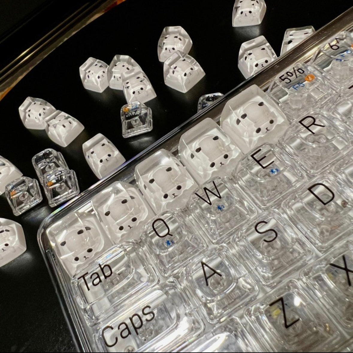 Immerse yourself in the enchanting world of this meticulously crafted resin panda keycap. This factory-original keycap is expertly designed for Cherry MX switches, ensuring a seamless fit on your keyboard. Its full-sized form guarantees compatibility across various keyboards, allowing you to infuse a touch of playfulness and personality into your typing experience.