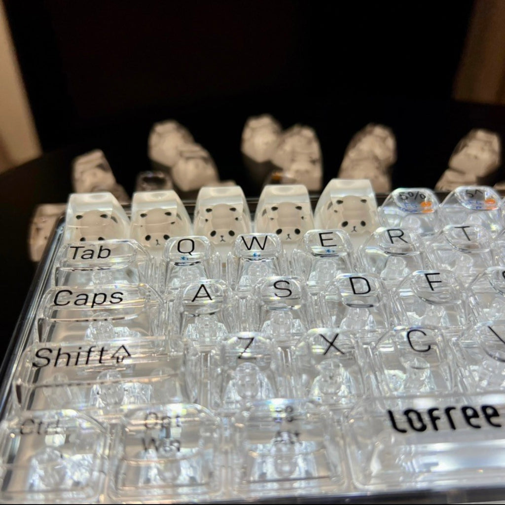 Immerse yourself in the enchanting world of this meticulously crafted resin panda keycap. This factory-original keycap is expertly designed for Cherry MX switches, ensuring a seamless fit on your keyboard. Its full-sized form guarantees compatibility across various keyboards, allowing you to infuse a touch of playfulness and personality into your typing experience.