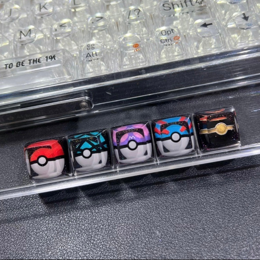 "Capture the essence of Pokémon with our 'Pokémon's Pokeball' Artisan Custom Keycaps. These meticulously crafted keycaps pay homage to the iconic Pokéball design, adding a playful touch to your keyboard. Each keycap is a unique collectible, showcasing your love for the Pokémon universe. Elevate your keyboard setup with these delightful artisan keycaps and embark on a typing adventure." ⚡🔴💻 #KeyboardAccessories #ArtisanKeycaps #PokémonLove