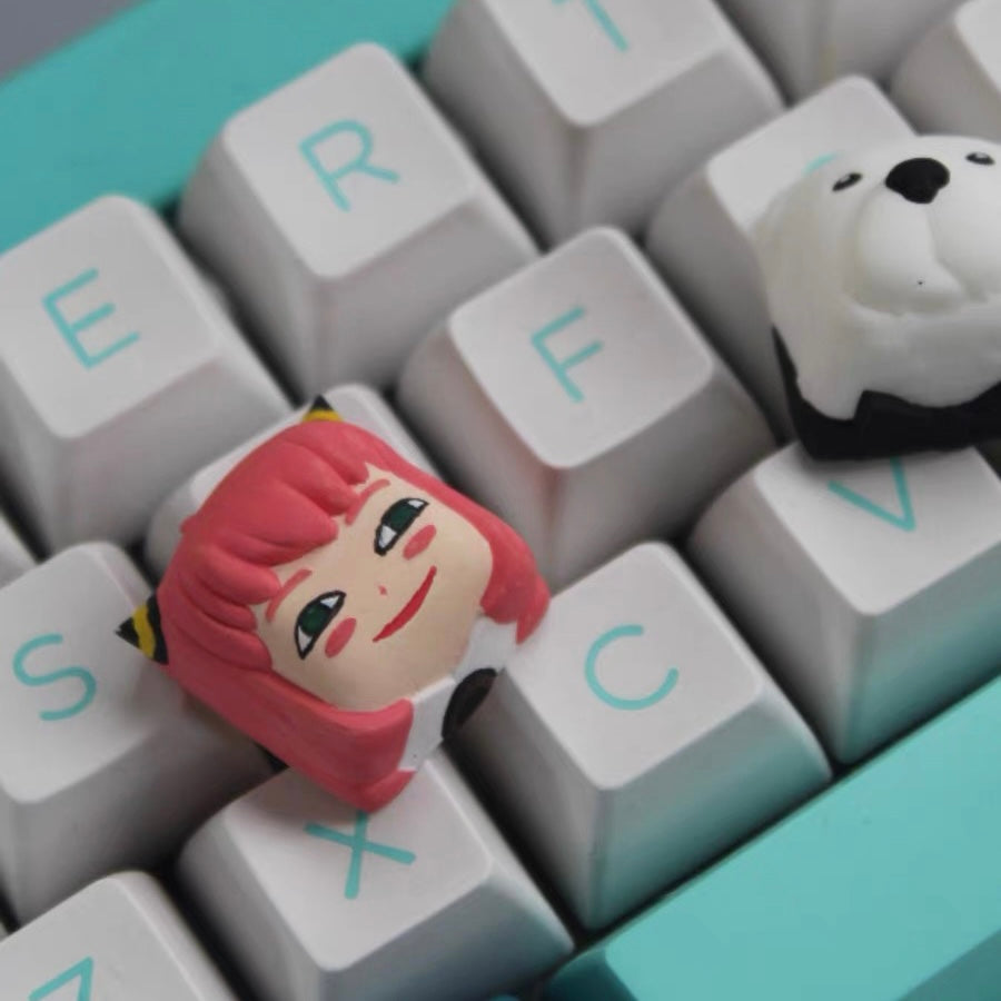 SPY x FAMILY Anya Forger custom keycap with a cute pink color, embodying her spirited and whimsical character.
