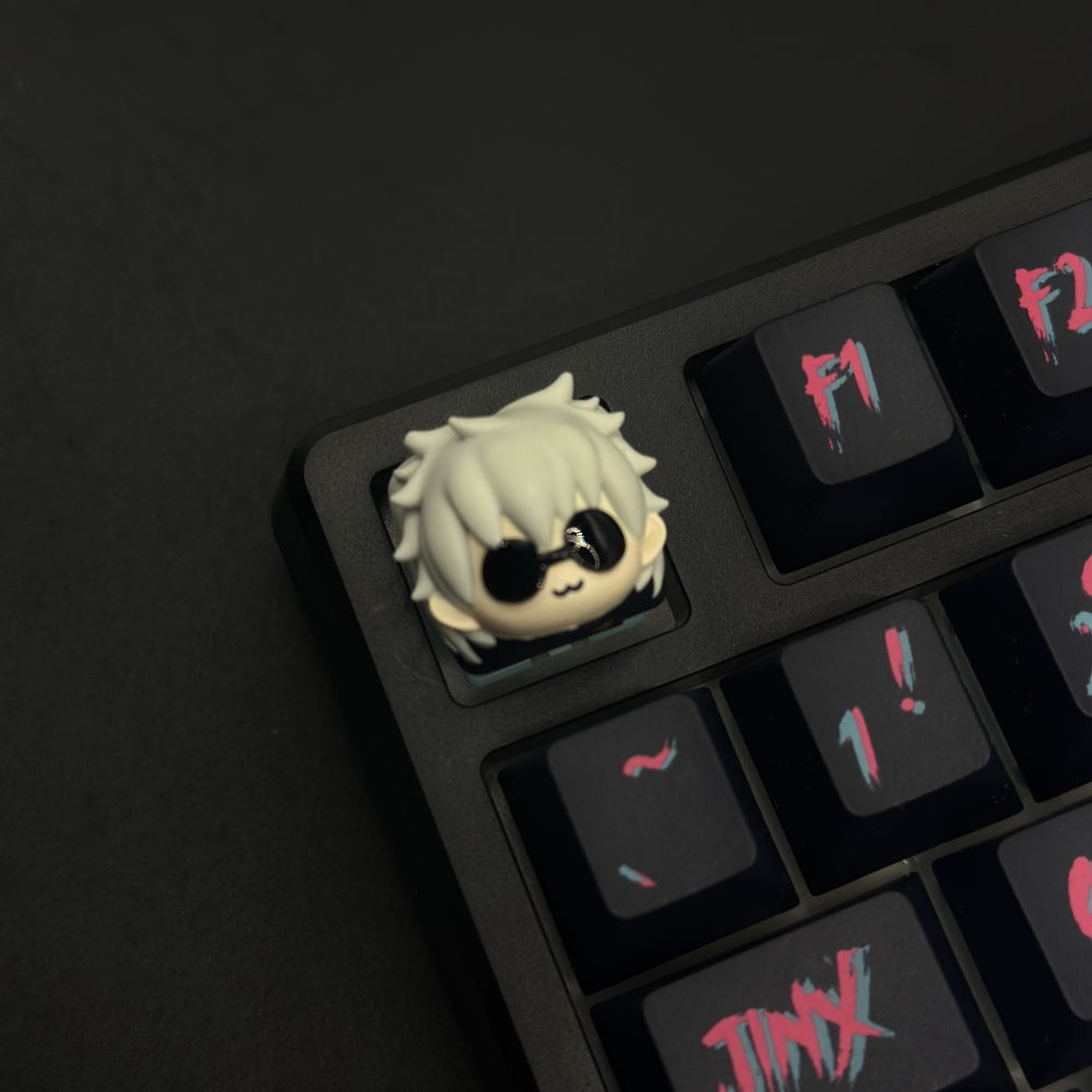 Satoru Gojo Artisan Keycap Jujutsu Kaisen Custom resin keycaps. Made from high-quality resin, it's designed to withstand countless keystrokes while maintaining its vibrant colors and intricate design.