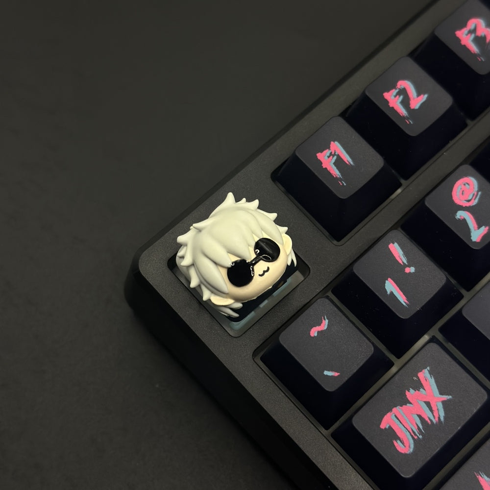 Satoru Gojo Artisan Keycap Jujutsu Kaisen Custom resin keycaps. Made from high-quality resin, it's designed to withstand countless keystrokes while maintaining its vibrant colors and intricate design.