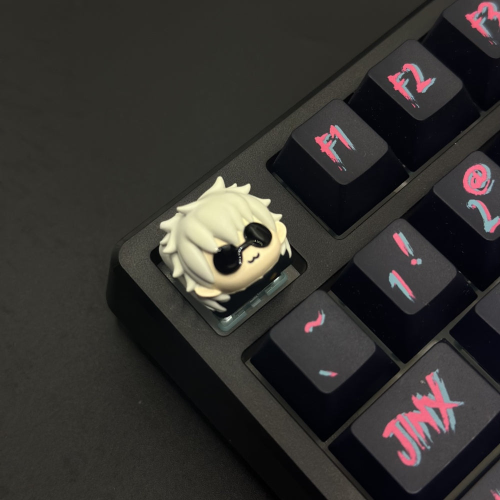 Satoru Gojo Artisan Keycap Jujutsu Kaisen Custom resin keycaps. Made from high-quality resin, it's designed to withstand countless keystrokes while maintaining its vibrant colors and intricate design.