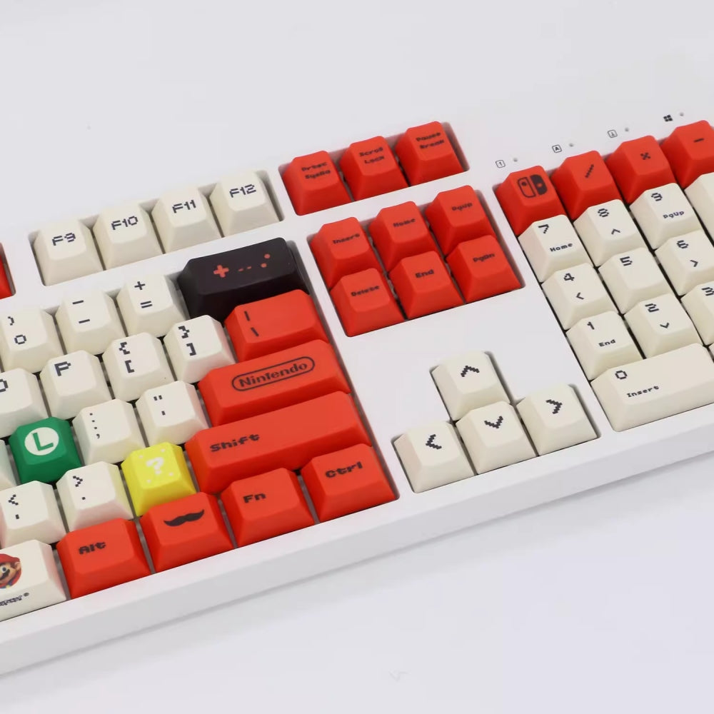 Super Mario Bros. themed PBT keycaps, 120-key set. Custom design captures the iconic look, perfect for upgrading your keyboard.
