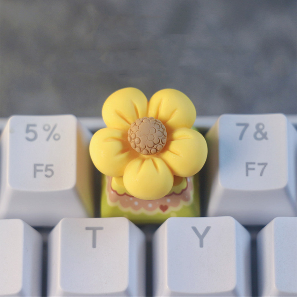 Sunflower Keycaps from aiheystudio artisan keycaps  Unique artisan keycap featuring a bright yellow flower, crafted with attention to detail for a vibrant and lively aesthetic.
