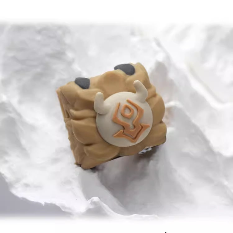 Unique resin keycap inspired by Genshin Impact's Unusual Hilichurl, perfect for adding a playful touch to any mechanical keyboard.
