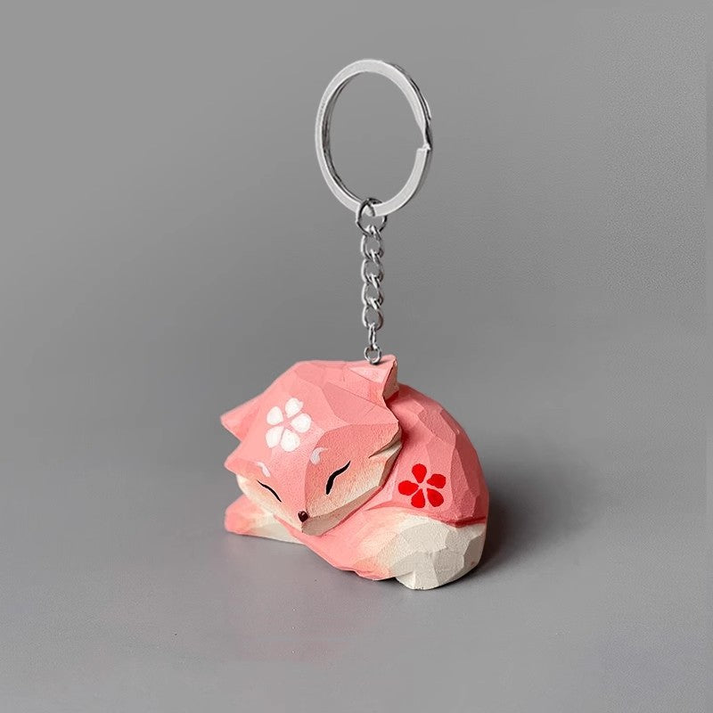 Yae Miko wooden keychain, intricately hand-carved, a stylish keyring or bag charm for fans of Genshin Impact and its characters.
