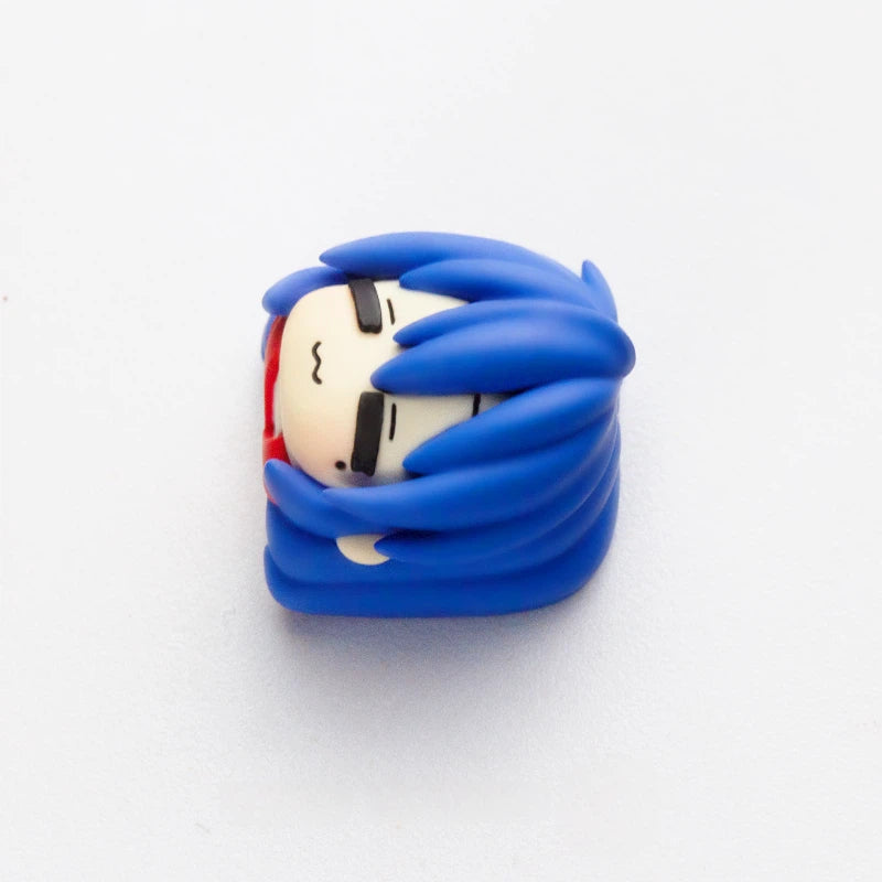 close-up-view-of-blue-haired-anime-girl-keycap-showing-layered-resin-details-cute-hairstyle-and-handcrafted-finish