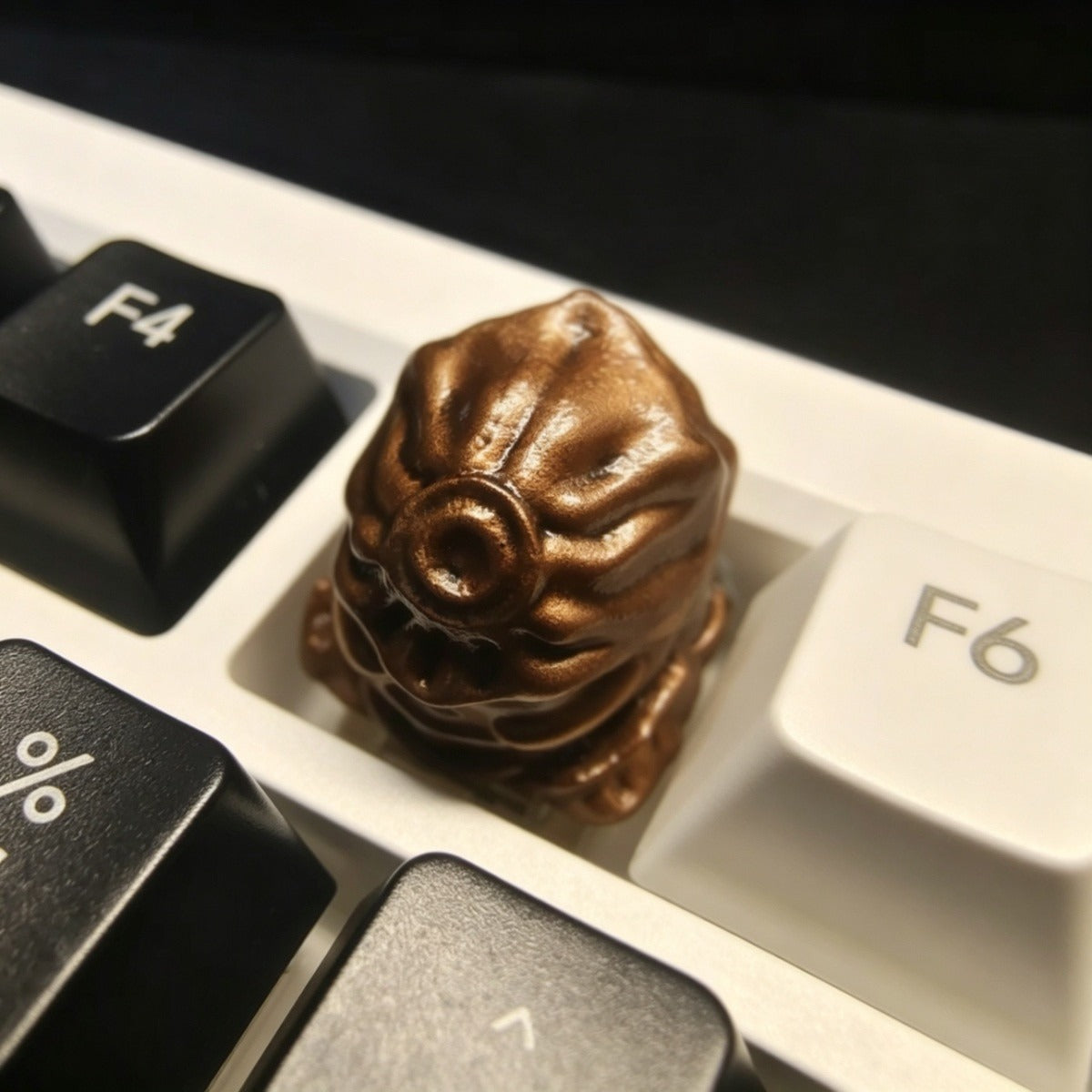 Dark fantasy resin artisan keycap featuring medieval warrior details and handcrafted epoxy design