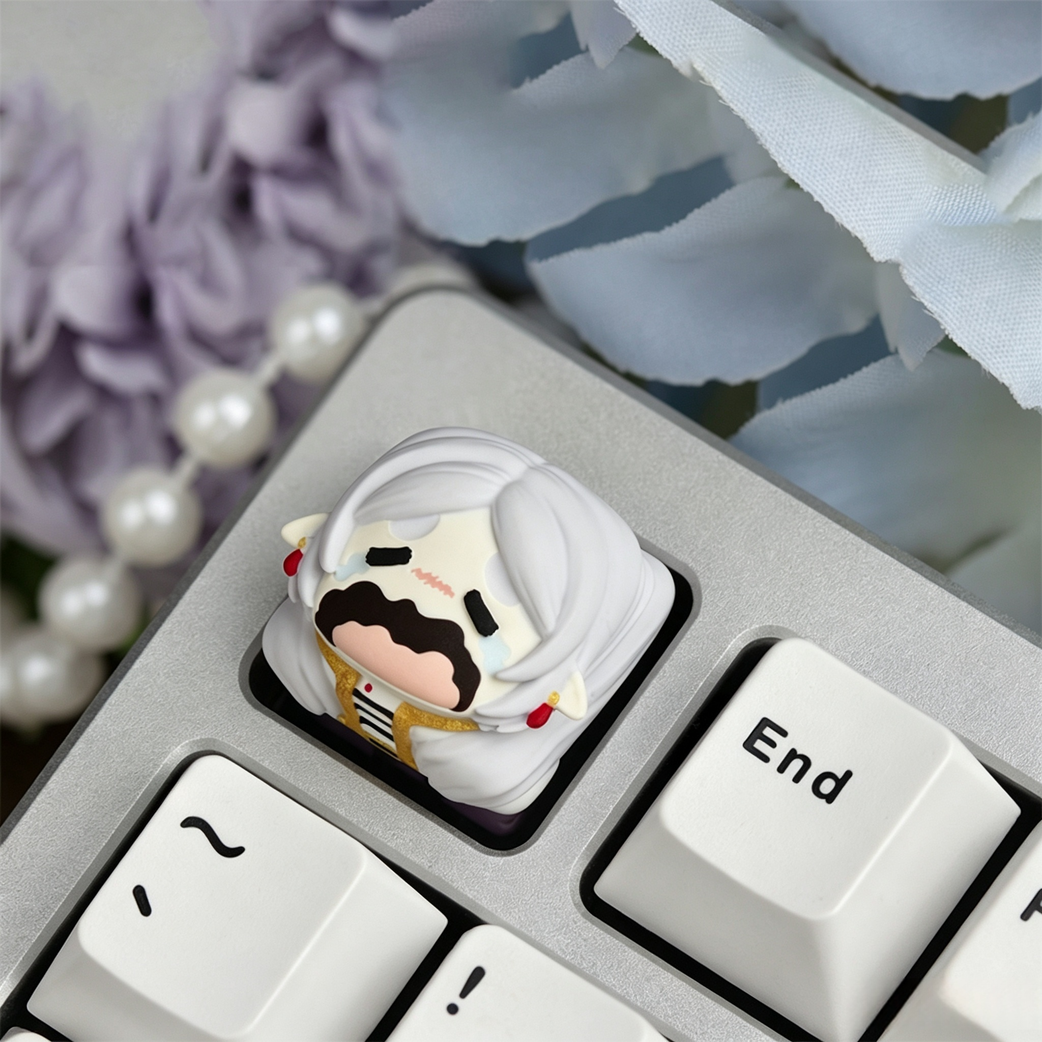Detailed-anime-epoxy-resin-keycap-with-layered-3d-character-effect-and-hand-polished-finish-for-mechanical-keyboards