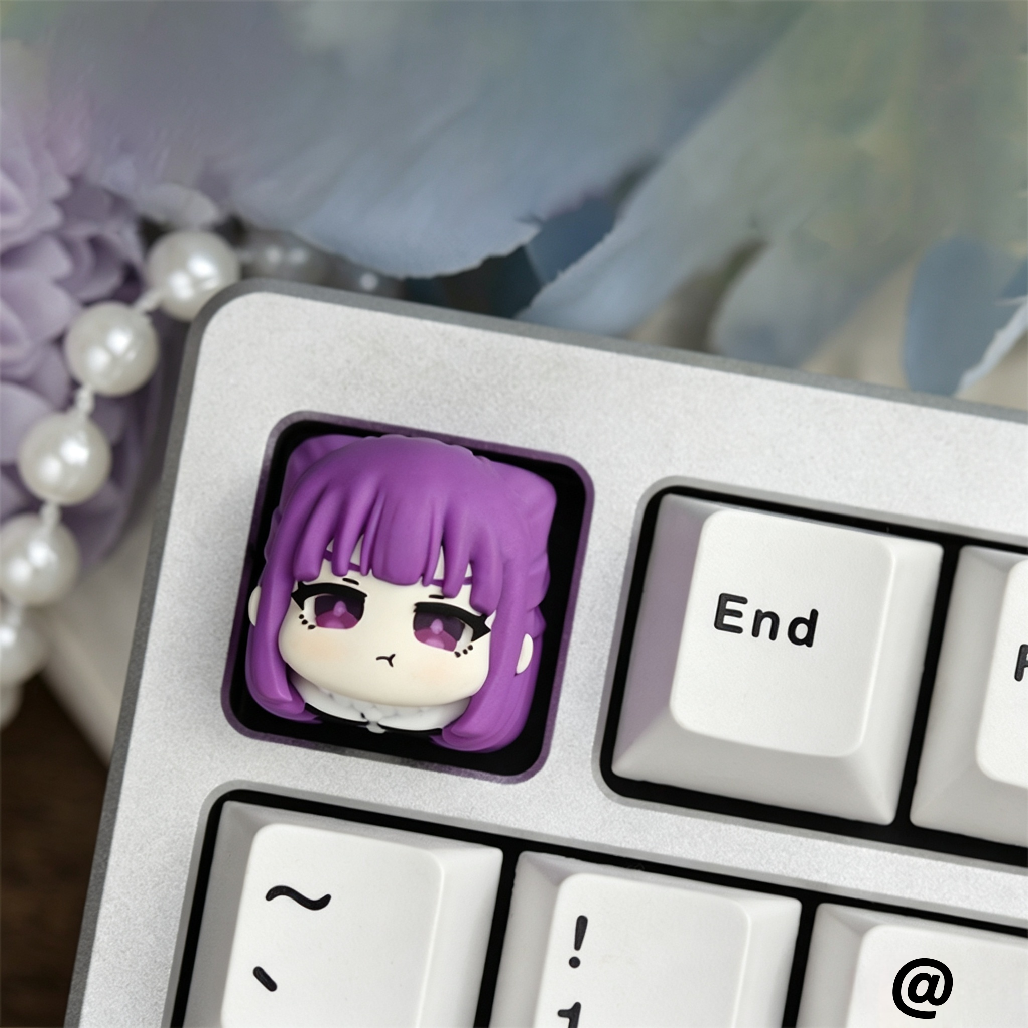 Frieren-beyond-journeys-end-artisan-keycap-collection-made-with-layered-epoxy-resin-for-custom-mechanical-keyboard-setups-and-anime-collectors