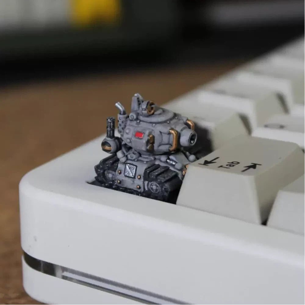 Grey tank artisan keycap featuring retro military vehicle details for gaming keyboard setups