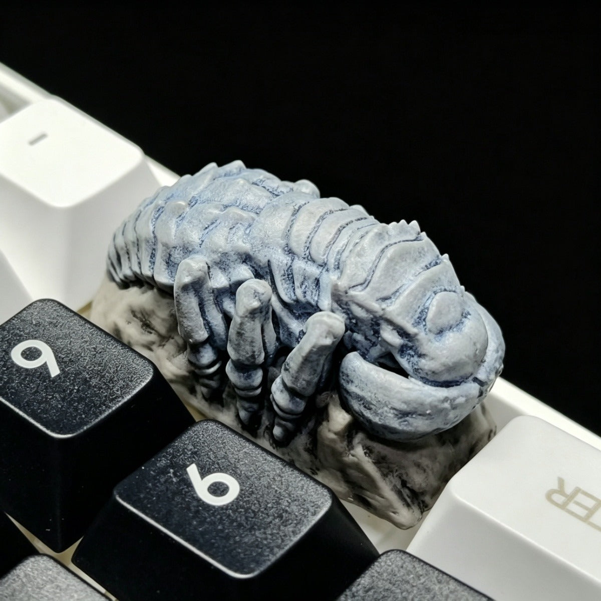 Handmade epoxy resin dark fantasy keycaps with layered three dimensional character details