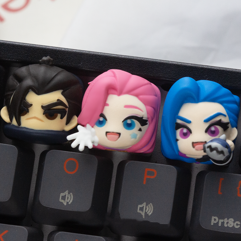 AiheyStudio’s trio of League of Legends artisan keycaps – Jinx, Zeri, and Seraphine characters in a stunning custom set. League of Legends inspired artisan keycaps by AiheyStudio, blending Jinx, Zeri, and Seraphine’s unique looks for a collectible feel