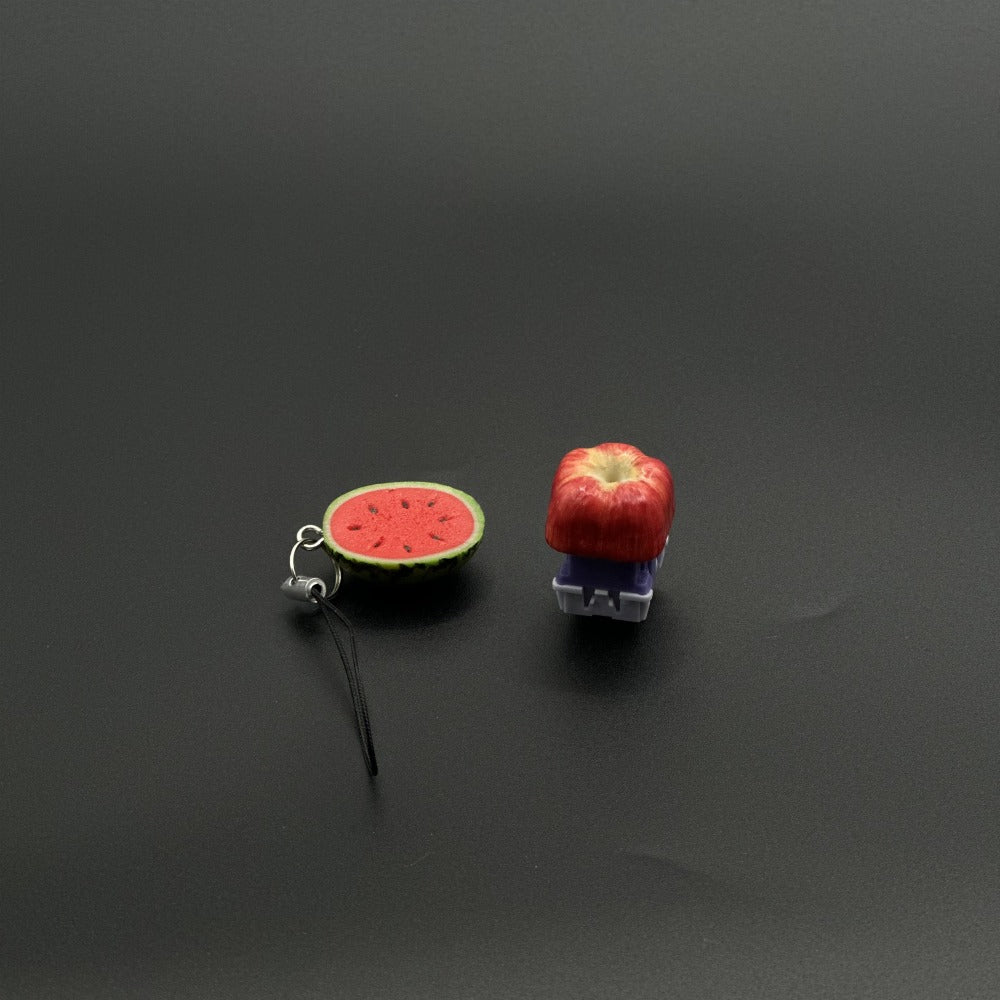 „Touch the Apple“-Tastenkappen. Naturgetreue personalisierte Obst-Tastenkappen von Apple