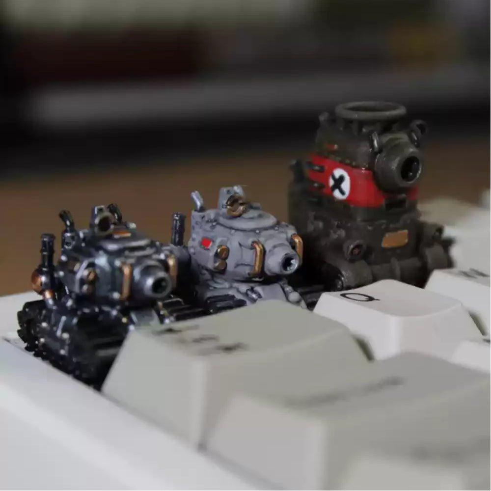Metal Slug inspired tank artisan keycap collection featuring miniature retro arcade military tanks for mechanical keyboards