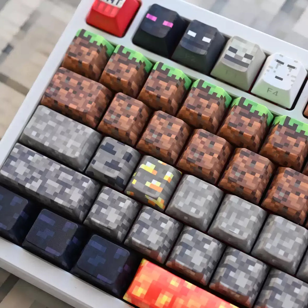 Minecraft custom keycap set with grass dirt stone diamond ore and pixel landscape artwork