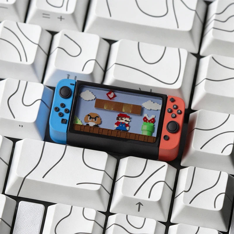 miniature-game-console-resin-keycap-with-colorful-mario-inspired-adventure-scene-and-handcrafted-epoxy-details