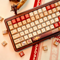 detailed-monster-hunter-inspired-keycaps-with-guild-emblems-monster-tracking-icons-and-vintage-game-style-patterns