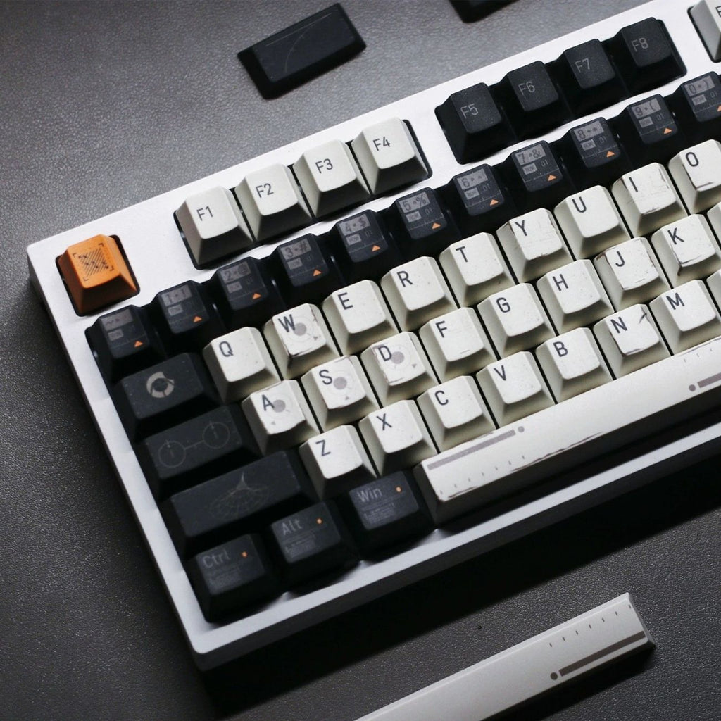 Custom mechanical keyboard featuring Nico Interstellar keycaps with futuristic space exploration aesthetic for gaming and work setups