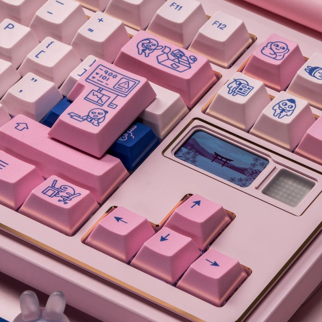 Close-up view of NICO POCO keycaps showing soft pink tones, decorative patterns, and detailed dye sublimation artwork