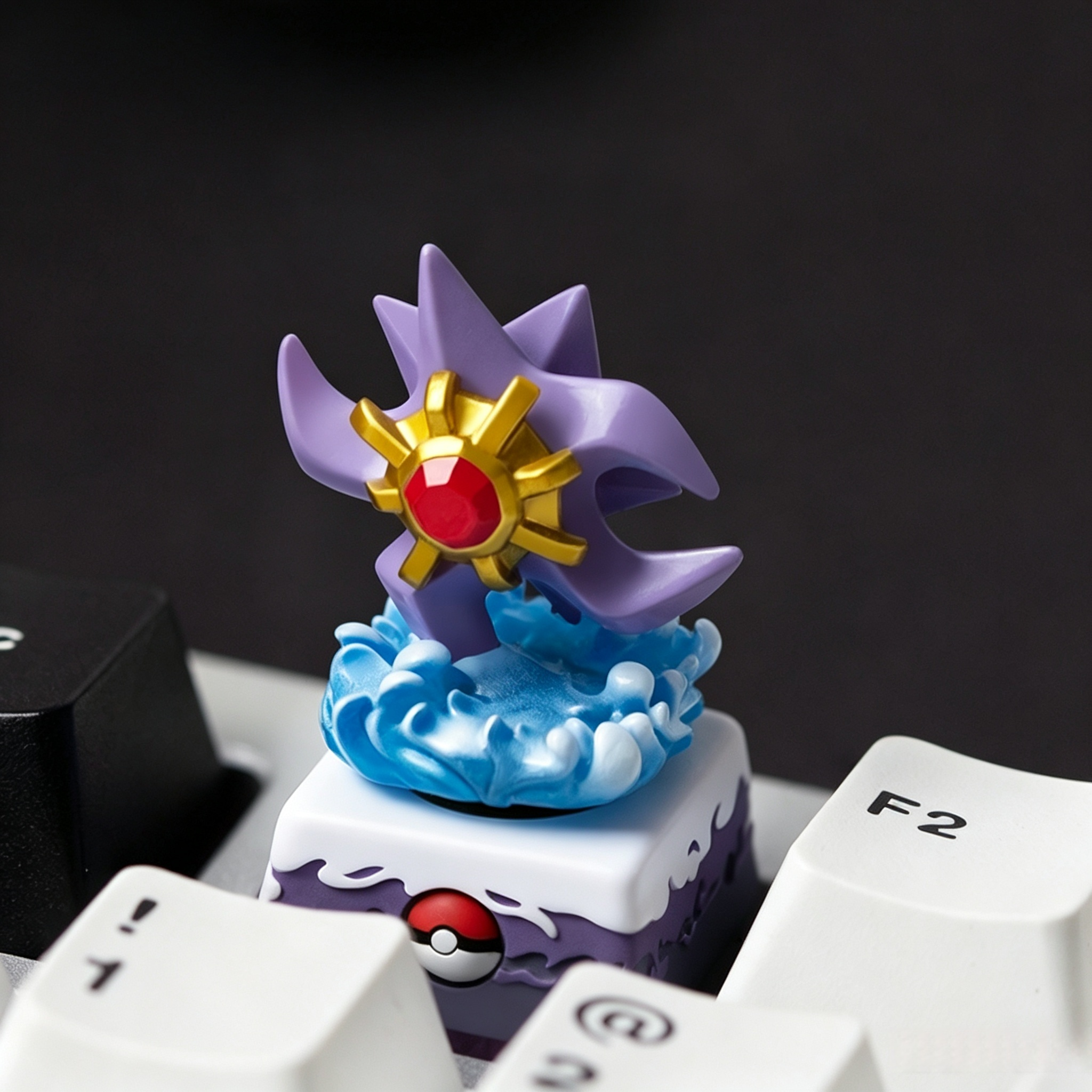 Pokemon-poke-ball-artisan-keycap-collection-made-with-layered-epoxy-resin-for-custom-mechanical-keyboard-setups-and-collectible-desk-accessories