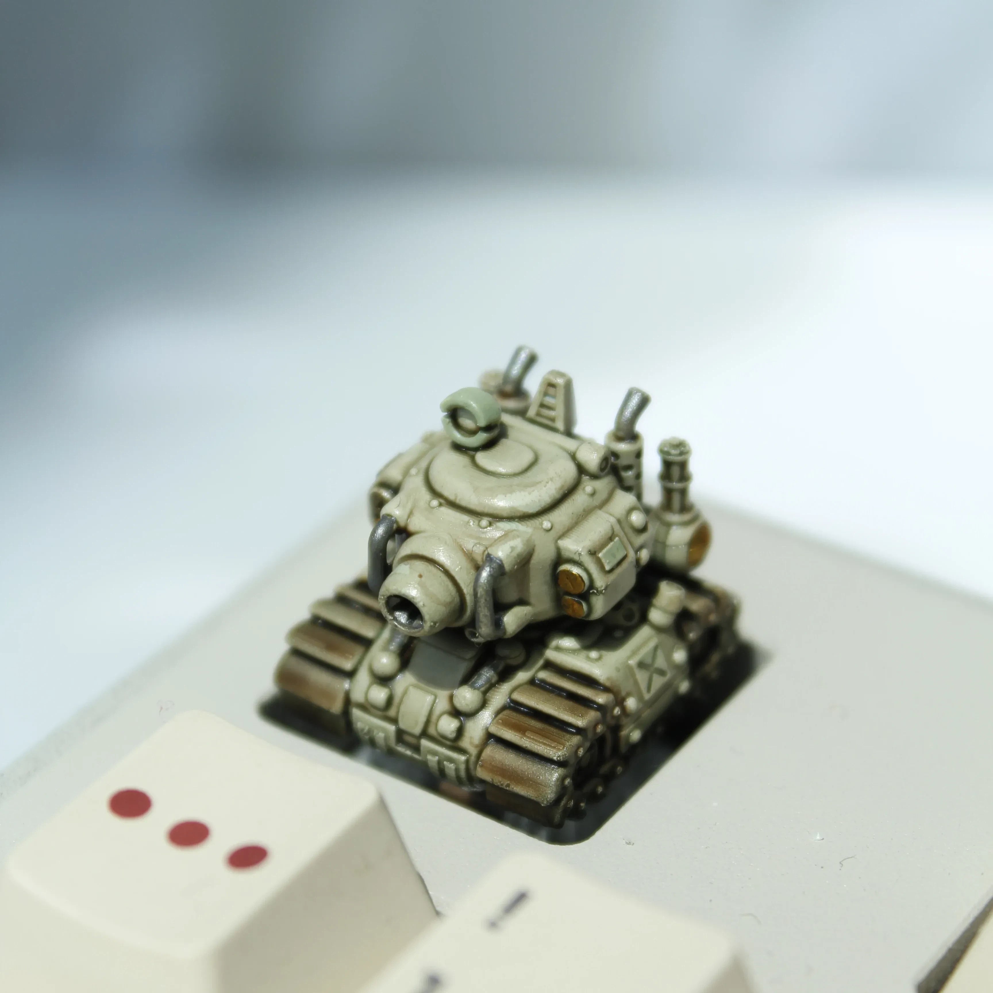 Sand yellow tank artisan keycap with detailed resin military vehicle design for personalized keyboards