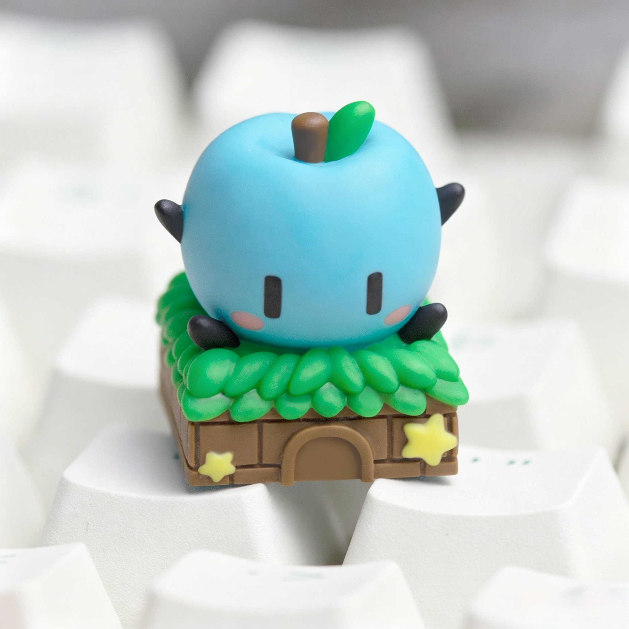 colorful-junimo-apple-resin-keycaps-featuring-yellow-pink-blue-and-green-designs-inspired-by-stardew-valley-for-mechanical-keyboard-lovers
